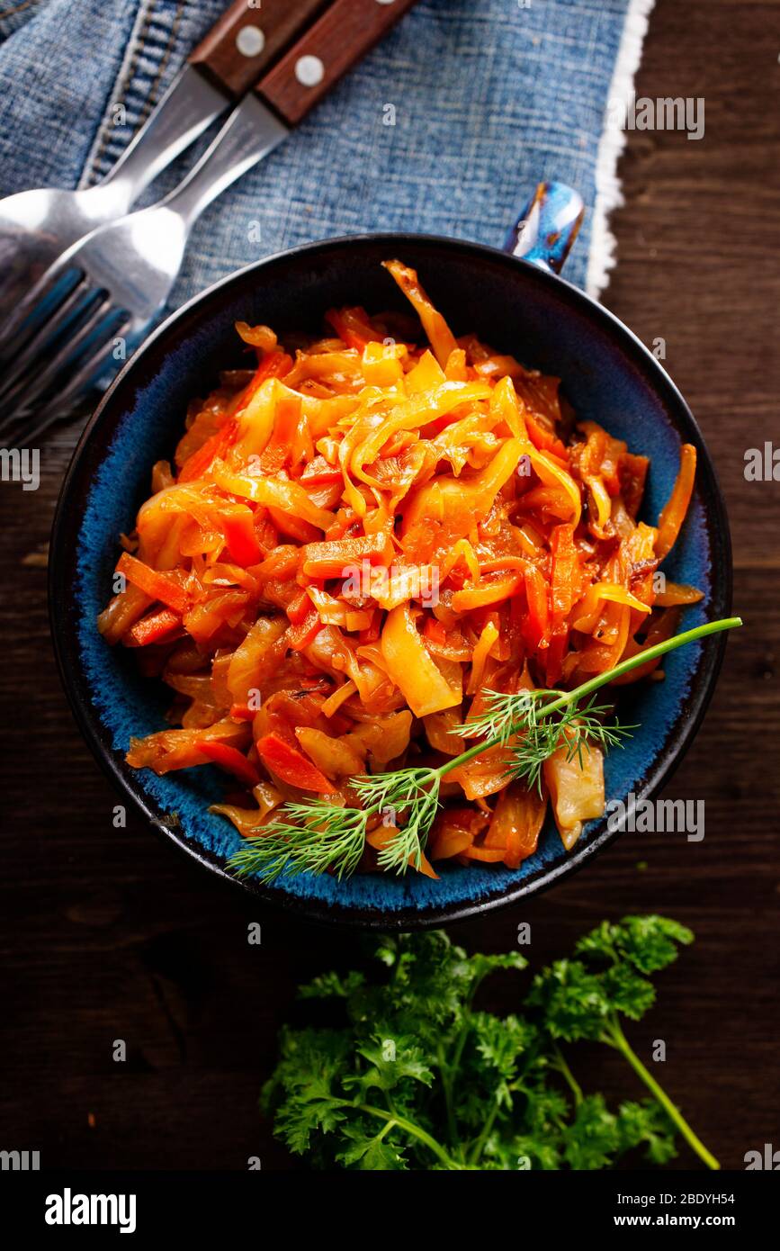 Cabbage stew with carrot in tomato sauce traditional dish of Russian