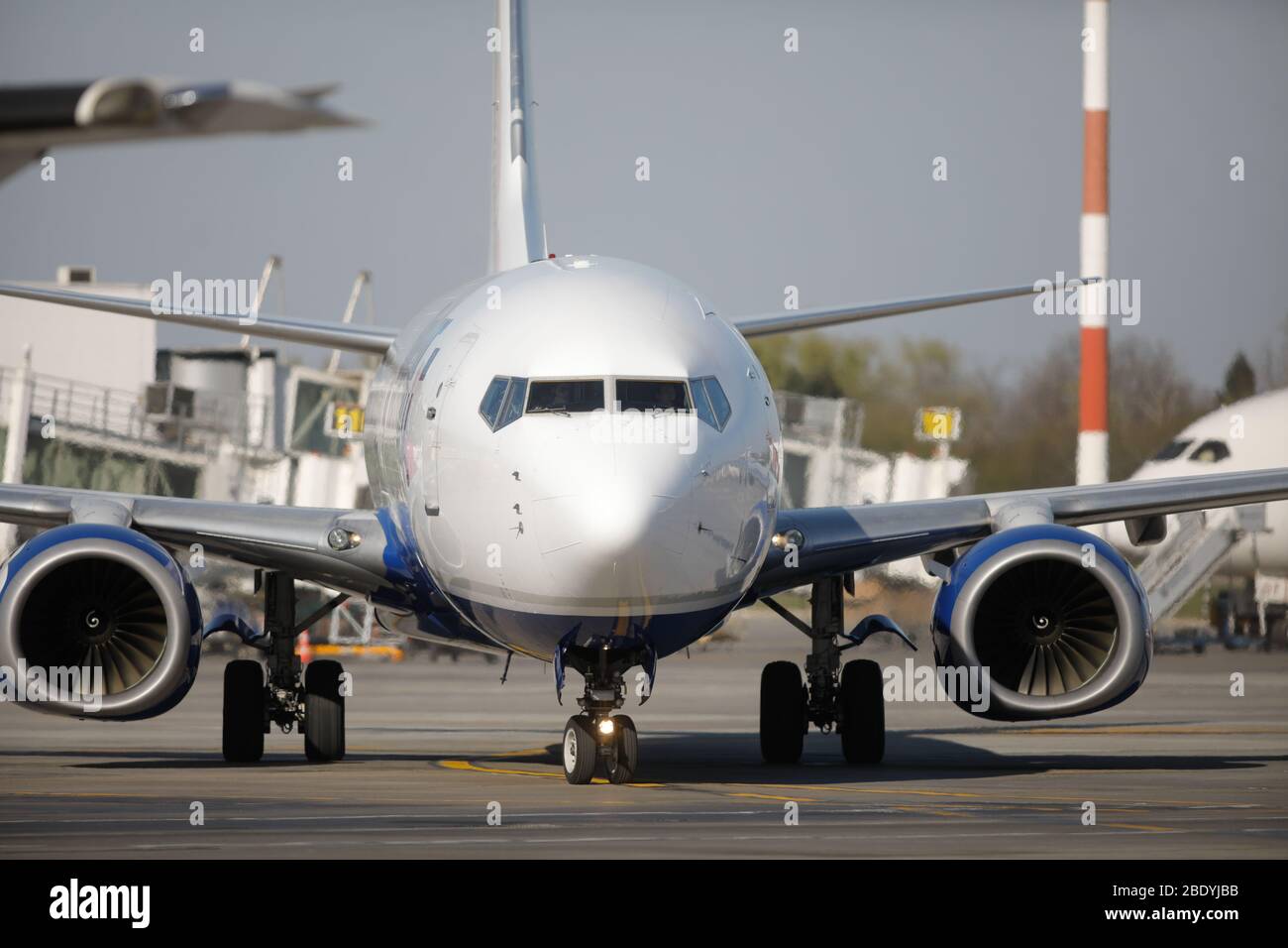 Otopeni, Romania - April 8, 2020: Blue Air airplane on Henri Coanda International Airport. Stock Photo