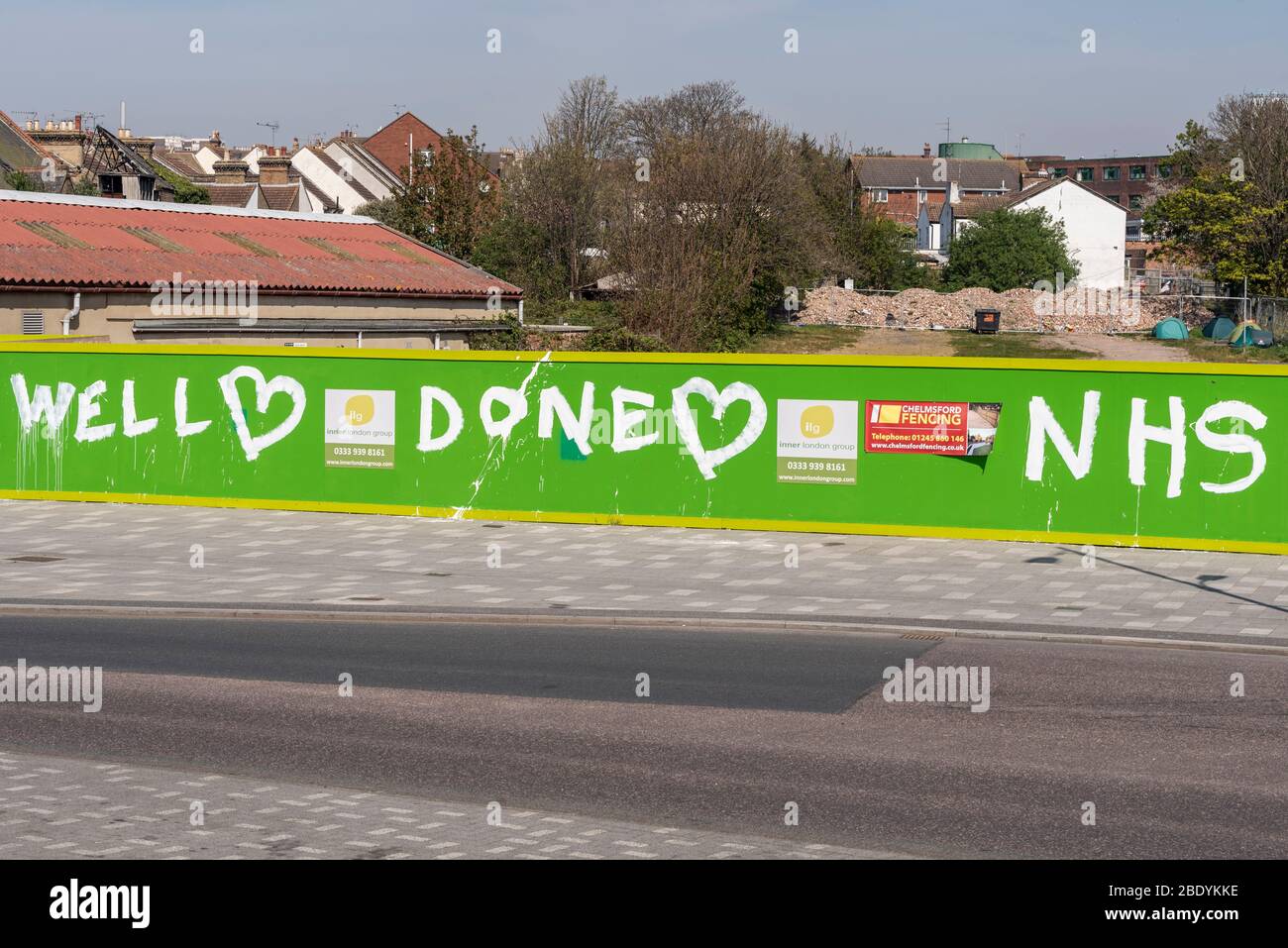 Well done NHS painted message on sunny day on Southend on Sea seafront on Good Friday of Easter during COVID-19 Coronavirus pandemic lockdown period Stock Photo