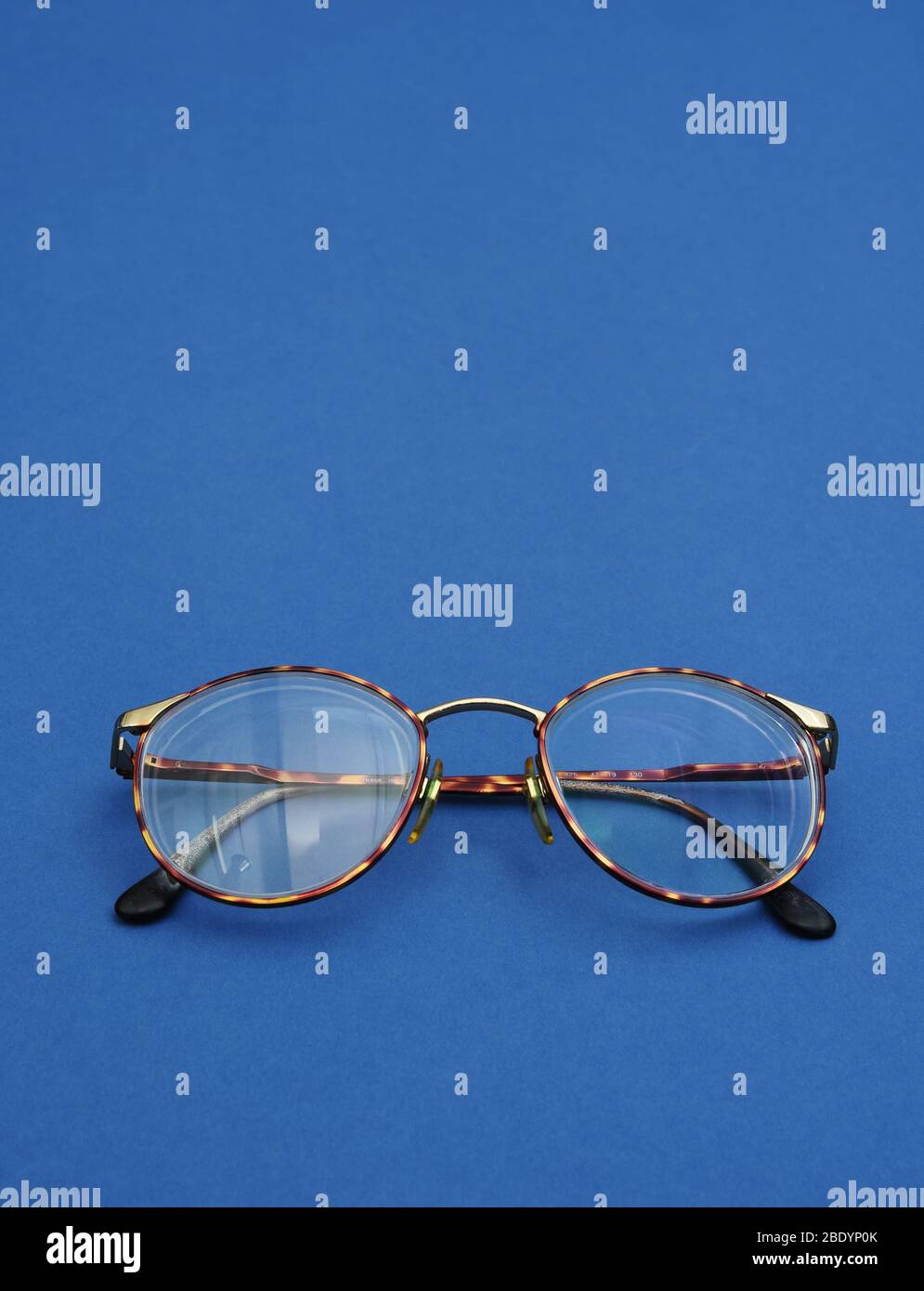 Glasses with reflective and non-reflective lenses Stock Photo