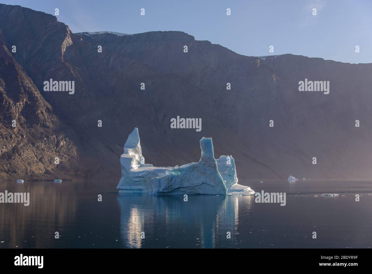 Iceberg With Rocks Greenland landscape with beautiful coloured rocks and iceberg Stock ...