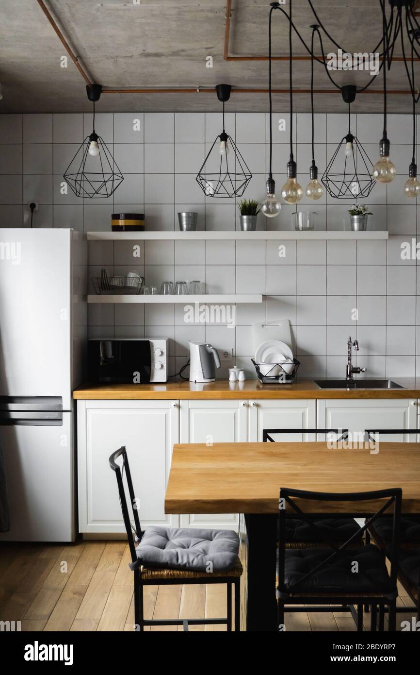 Modern, bright, clean, kitchen interior with stainless steel appliances ...