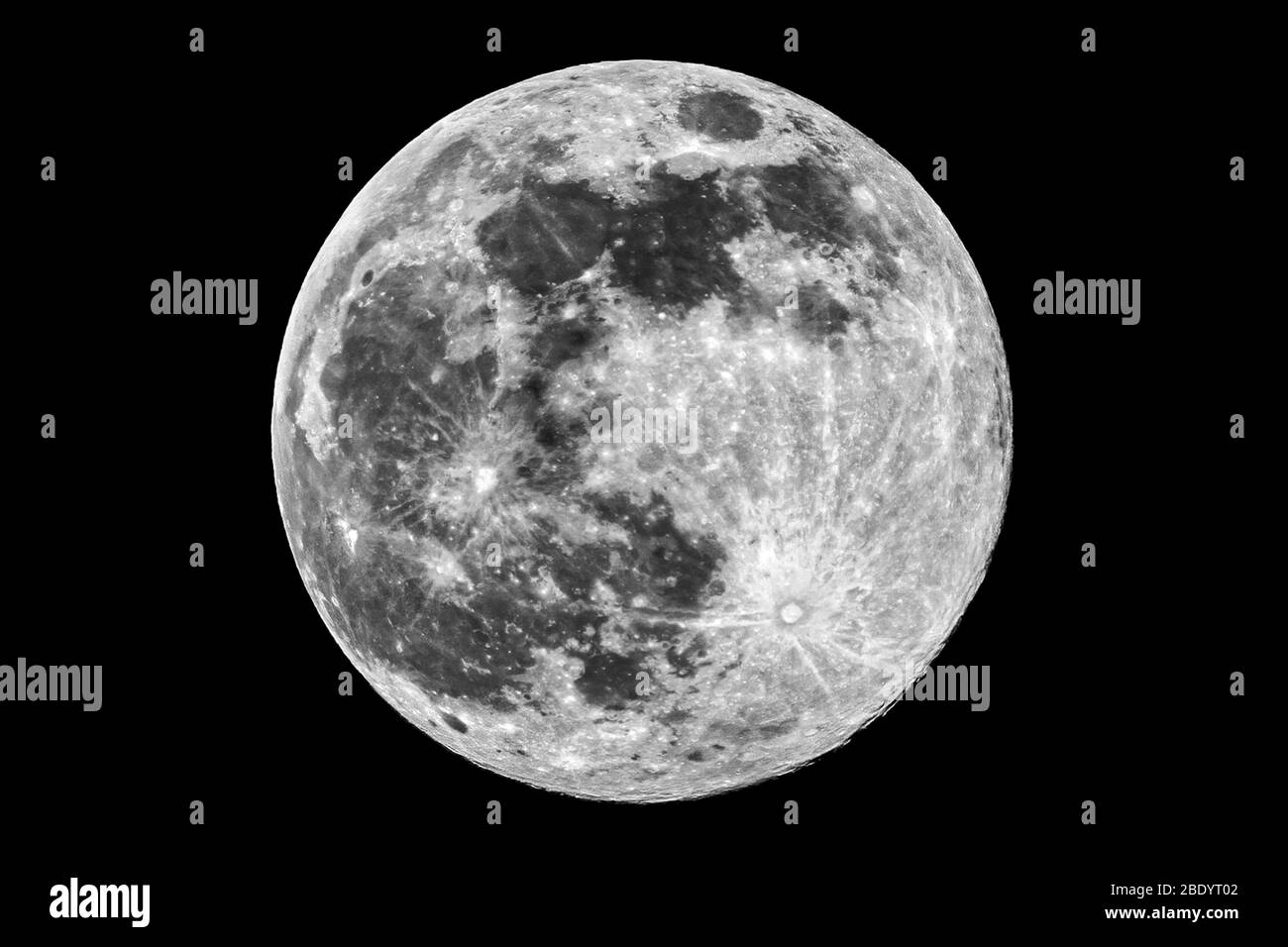The picture shows the super moon (full moon) over the city of Bottrop in North Rhine-Westphalia with a clear night sky. Stock Photo