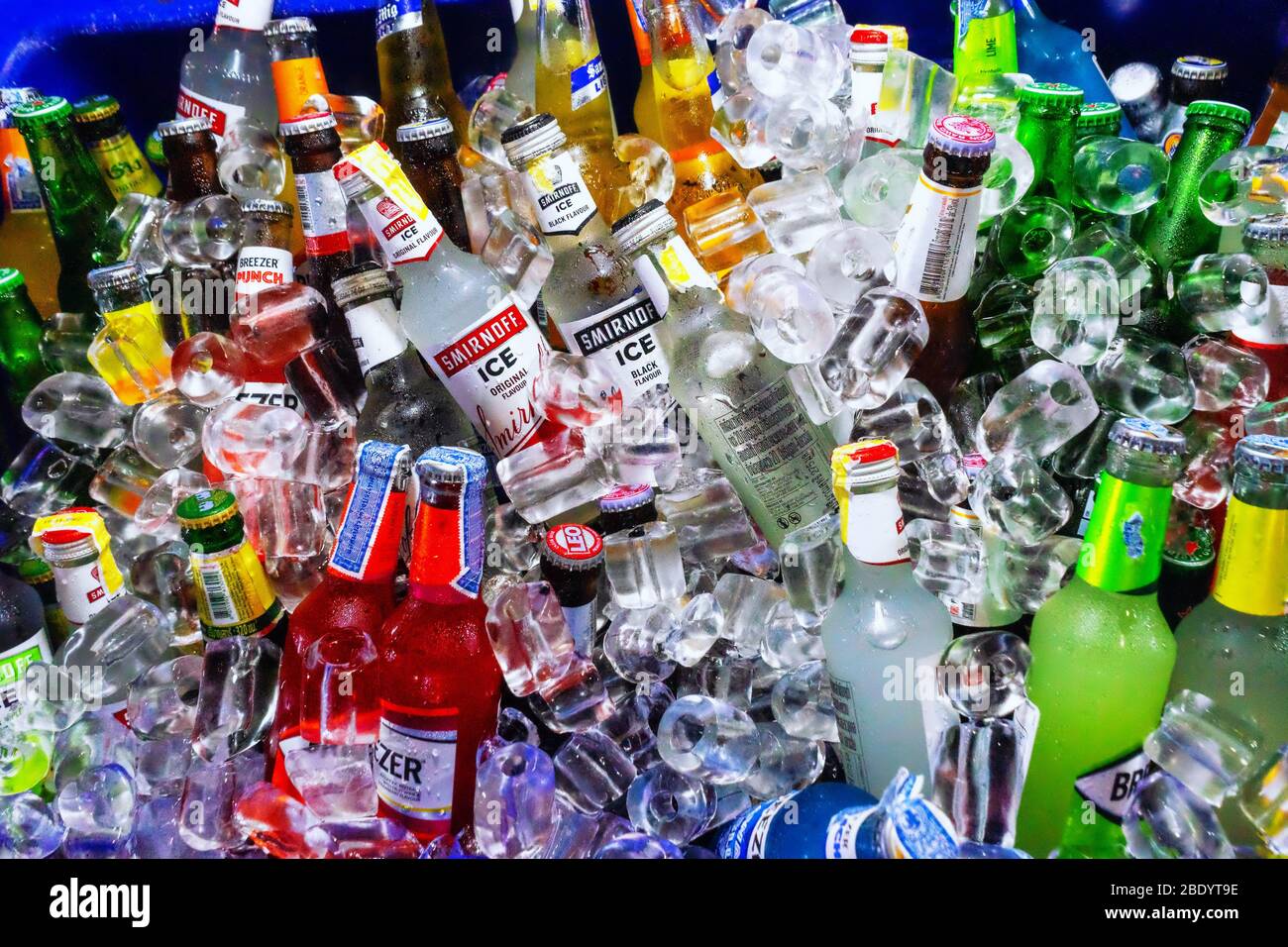 Large selection of bottled alcoholic drinks chilled in ice. Thailand, Bangkok, 2020-01-26 Stock Photo