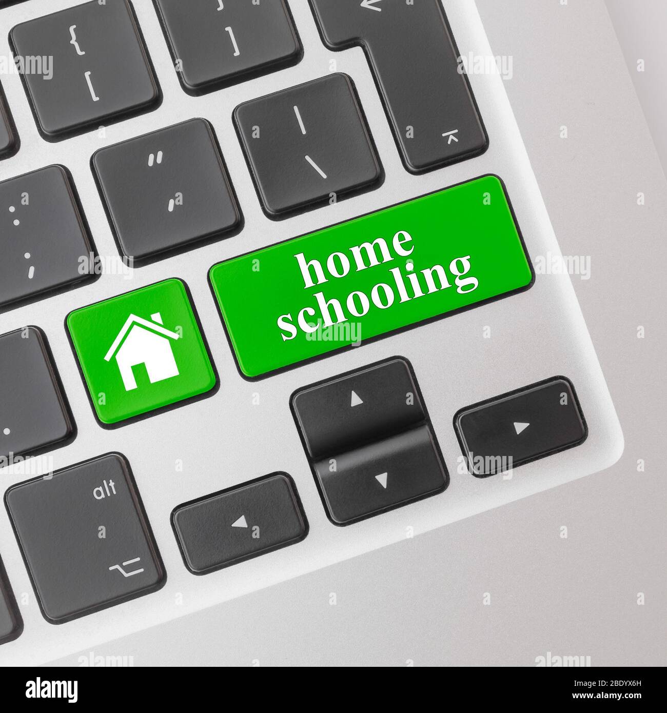 Home schooling concept. Computer keyboard with the word homeschooling. Stock Photo