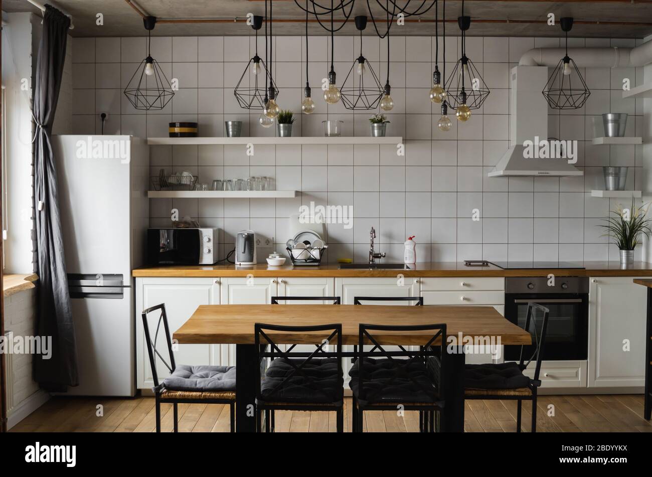 Modern, bright, clean, kitchen interior with stainless steel appliances ...