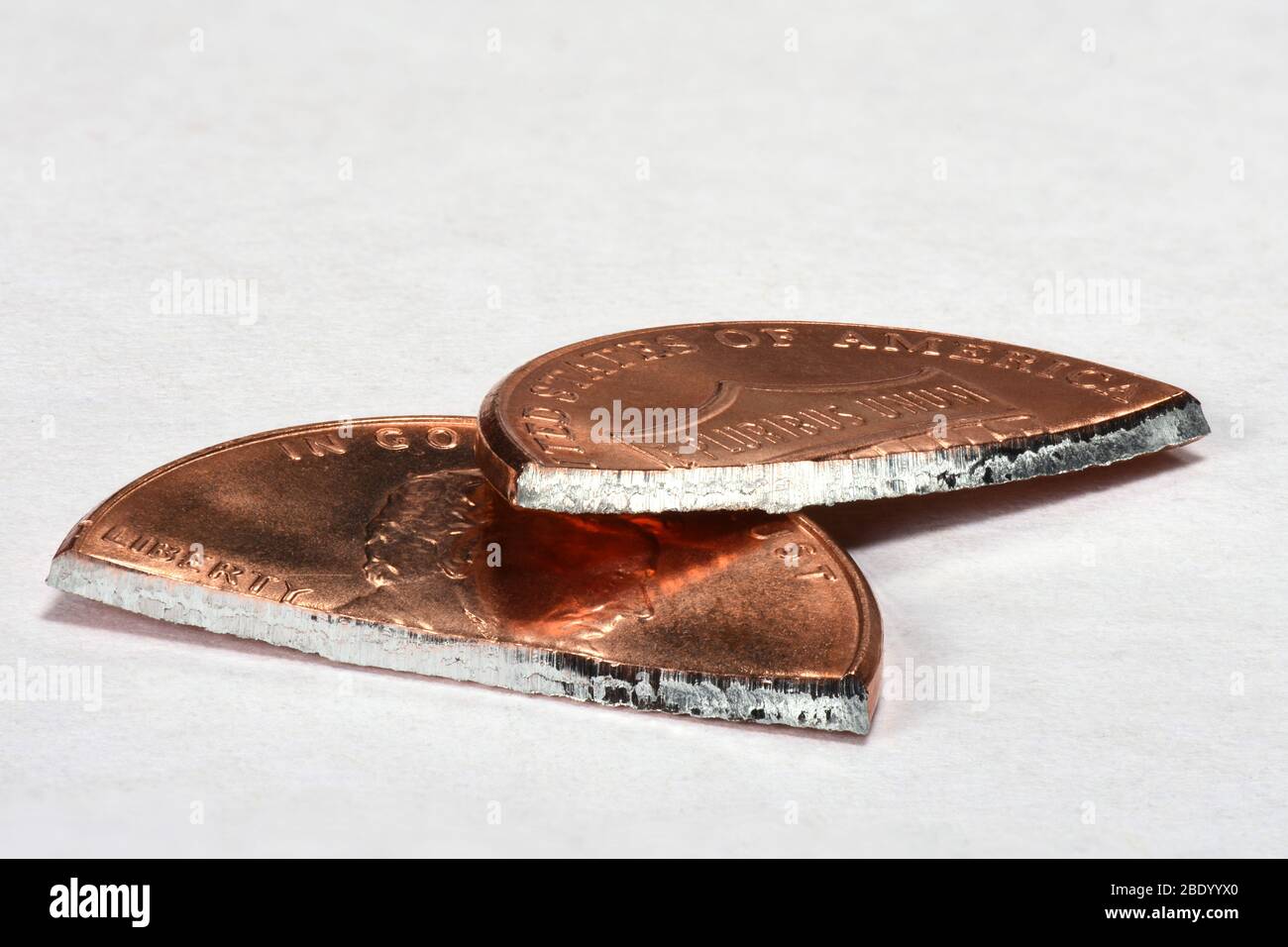 Cut Penny with zinc core Stock Photo