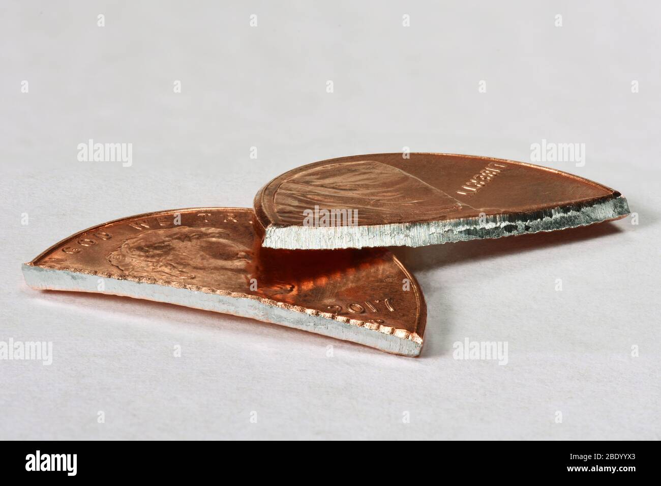Cut Penny with Zinc Core Stock Photo