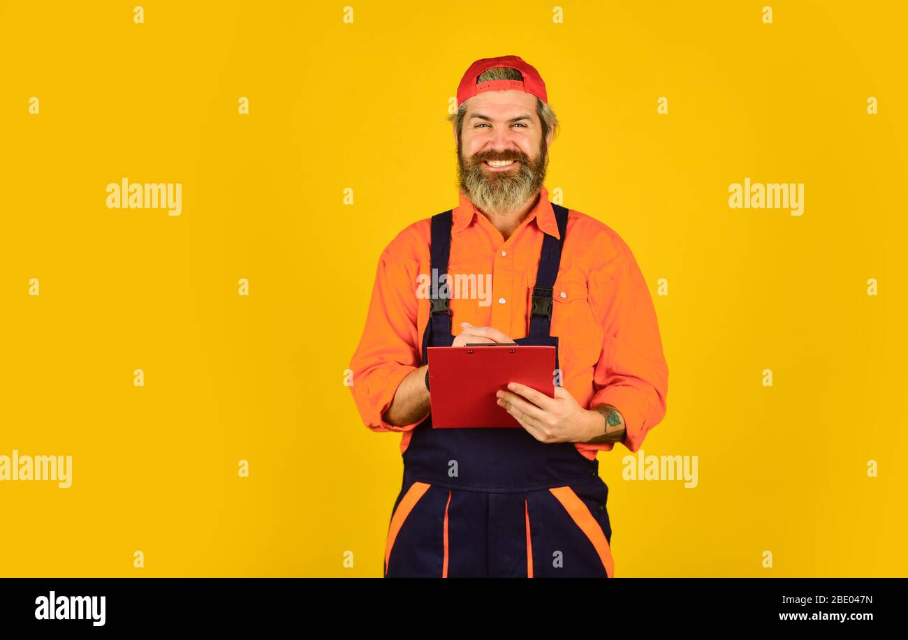 Inspector checking and inspecting building using checklist. apartment ...