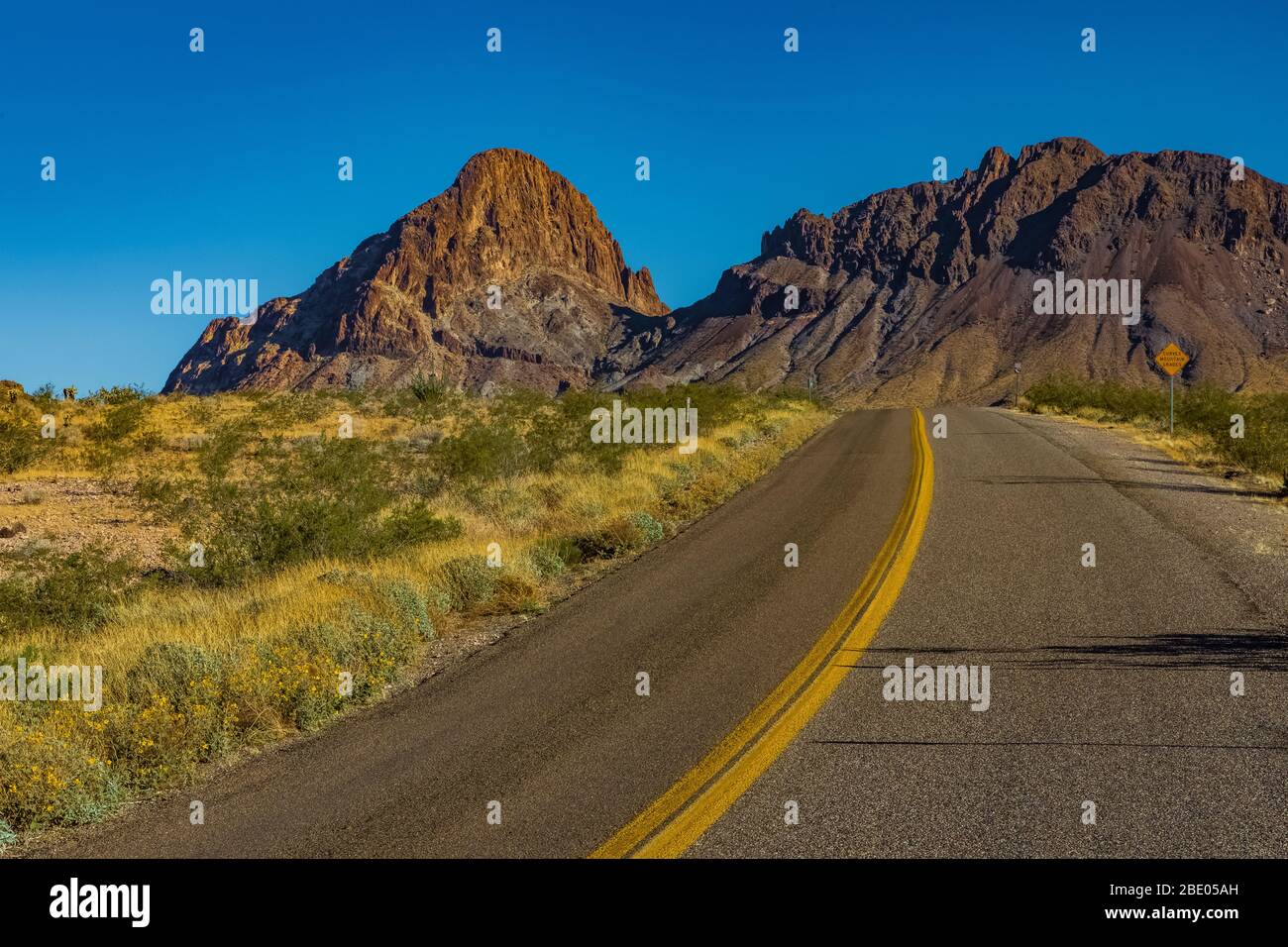 Driving Historic Route 66 near Oatman with Boundary Cone in the distance, Arizona, USA Stock