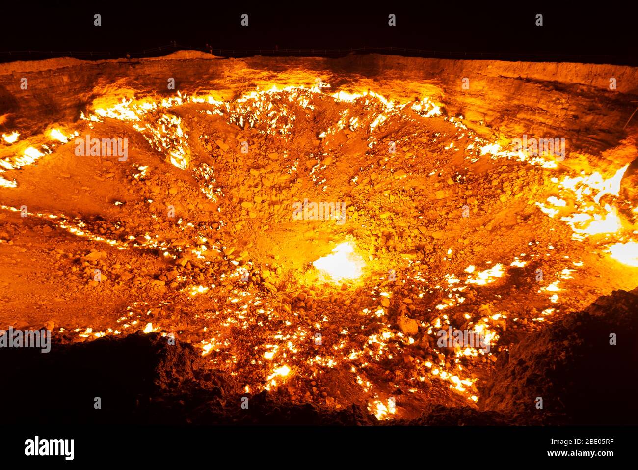 Darvaza Gas Crater in Turkmenistan near Derweze. Flames due to natural gas burning at night. Also know as Darwaza Gates to Hell or Door to Hell. Stock Photo