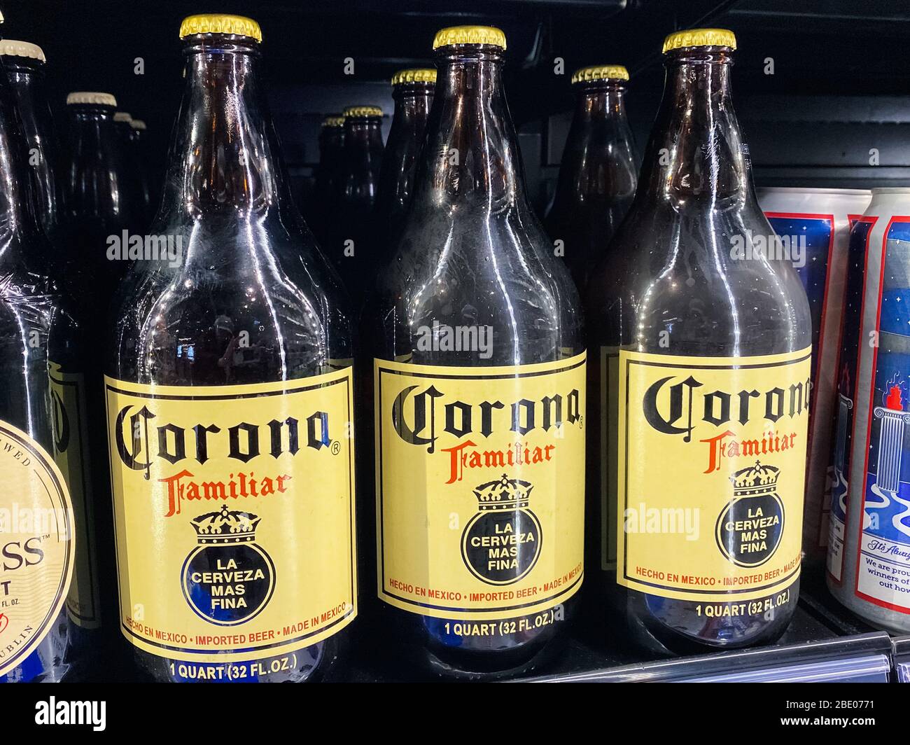 Jan 4, 2020 Santa Clara / CA / USA - Bottles of Corona Familiar beer for sale in a local supermarket; Corona is a pale lager produced by Cervecería Mo Stock Photo