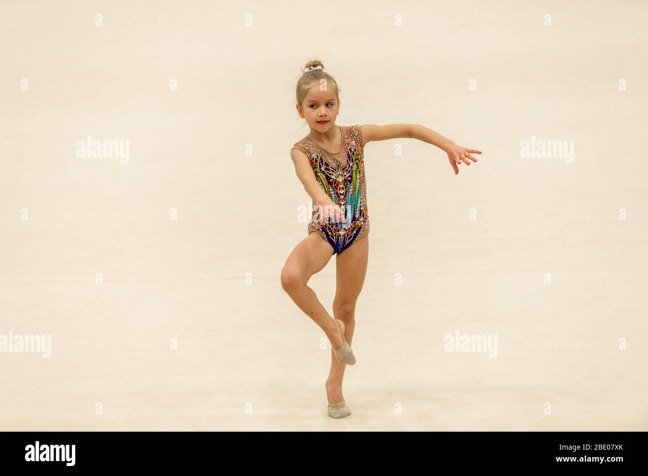 Portrait of a young gymnast. Portrait of a 7 years old girl in rhythmic  gymnastics competitions Stock Photo - Alamy