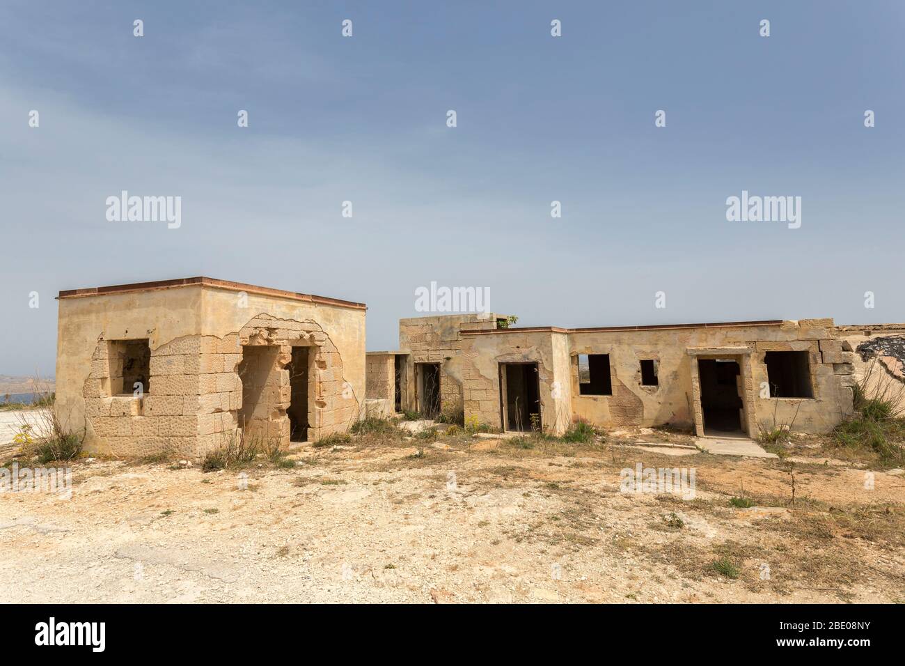 Ruined buildings, possibly dating from the second world war, at the end of Marfa Ridge, Malta Stock Photo