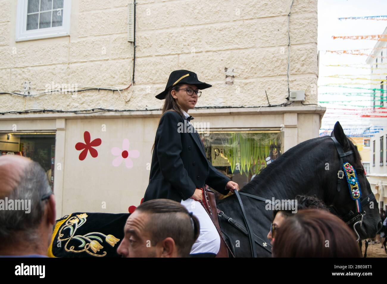 Traditional Spanish horse riding at Gràcia Festival in Mahón, Minorca Stock Photo