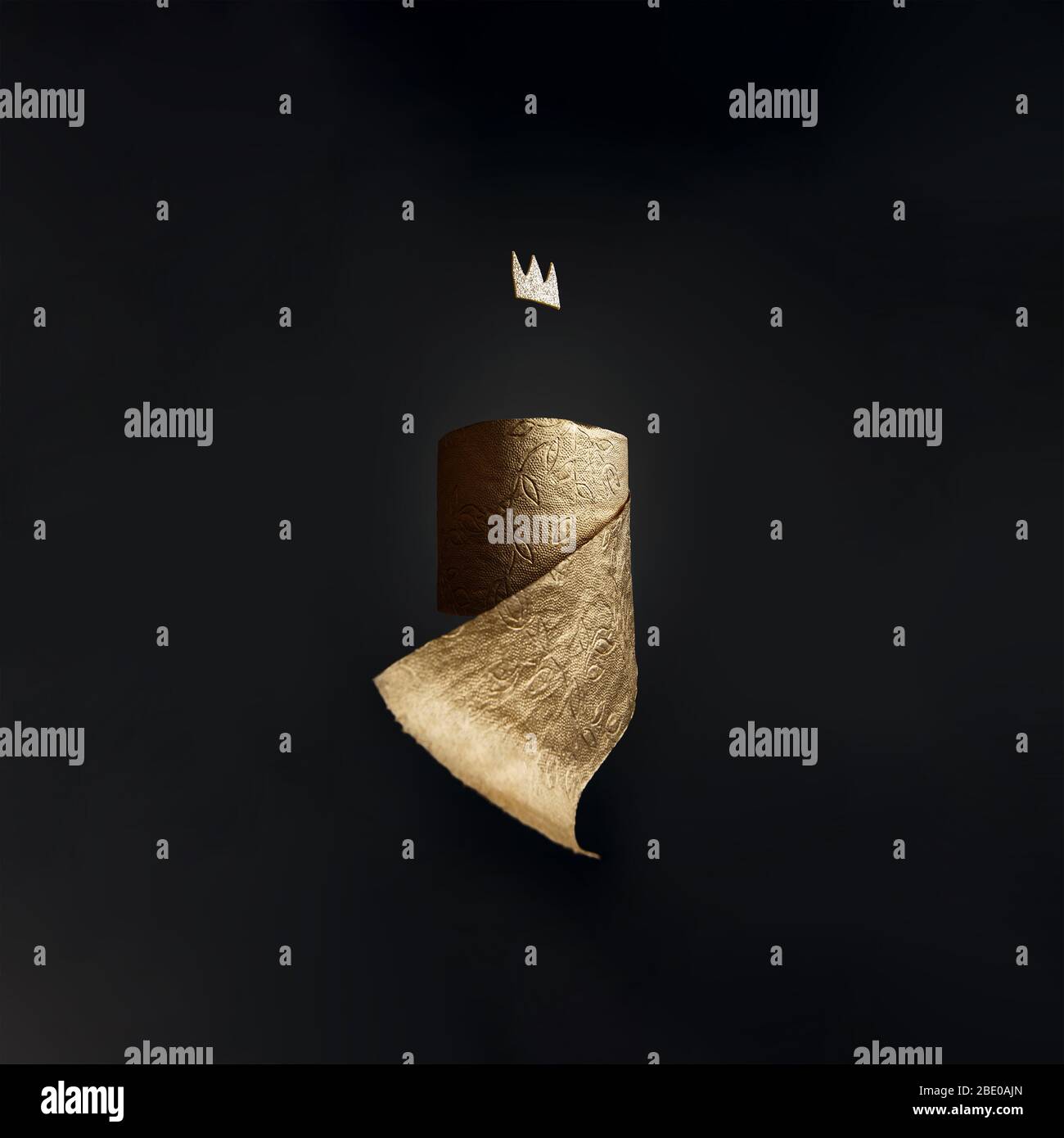 Gold toilet paper with a crown on a black background. A concept on the topic of coronavirus and pandemic. Stock Photo
