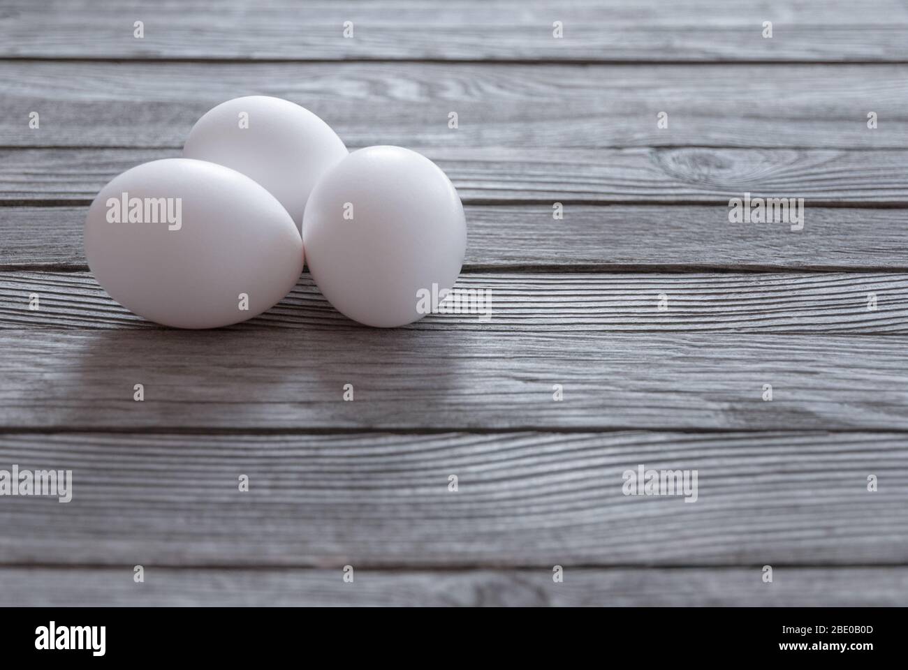 white eggs on wooden table Stock Photo