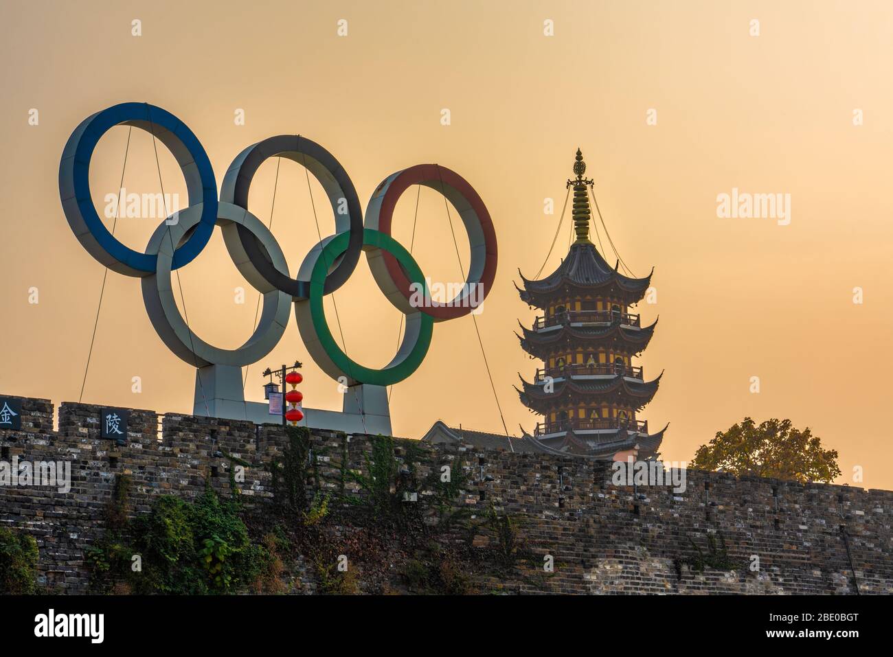 NANJING, CHINA - NOVEMBER 08: View of the Olympic sign on the Nanjing City Wall with Jiming Temple in the distance on November 08, 2019 in Nanjing Stock Photo
