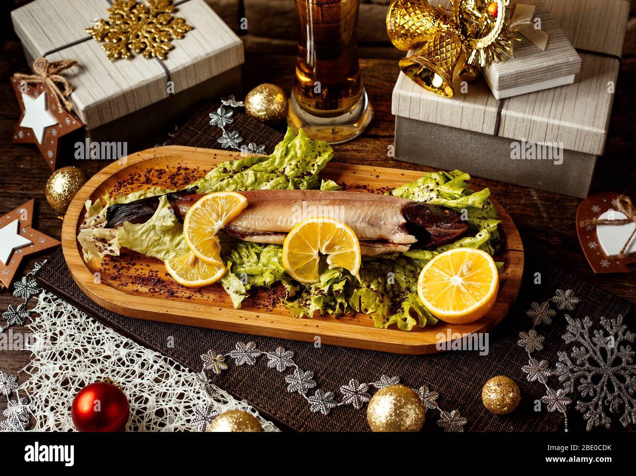 smoked fish with herbs and sliced lemons Stock Photo Alamy