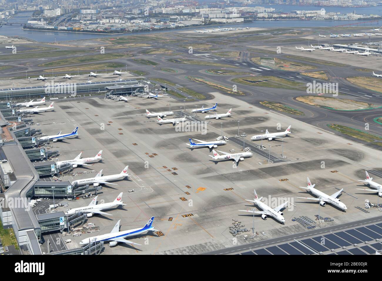 JAL and ANA airplanes lined up at Haneda Airport Terminal 3 (formerly known as International Terminal) one day after the emergency declaration on April 8, 2020. Credit: Tadayuki YOSHIKAWA/Aviation Wire/AFLO/Alamy Live News Stock Photo