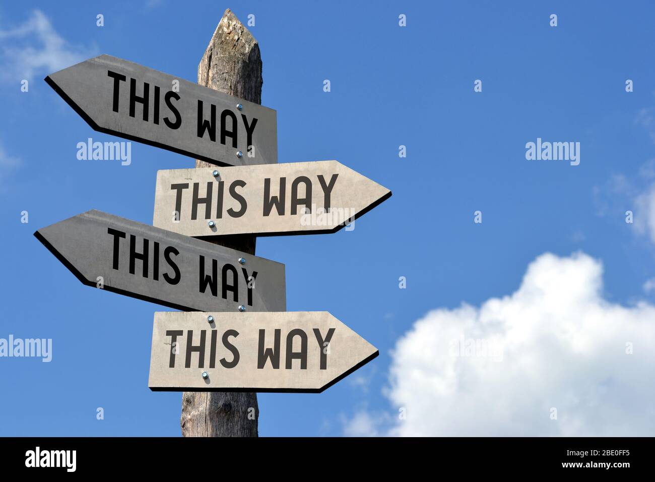 This way signpost Stock Photo - Alamy