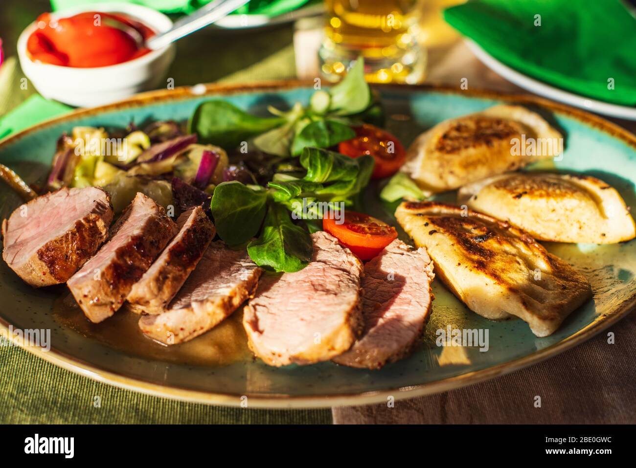 Serving of roast beef and roasted potatoes meal Stock Photo Alamy