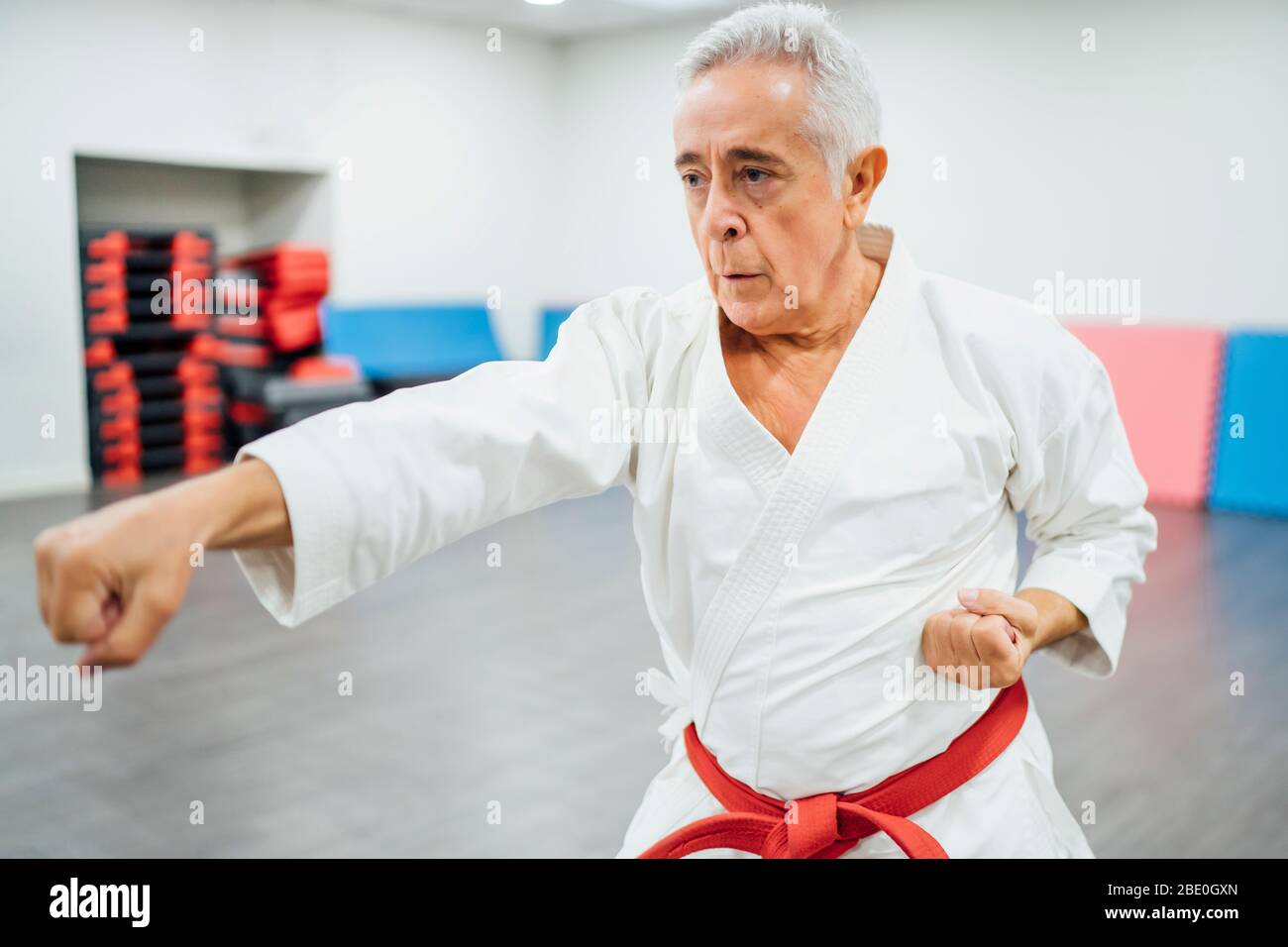 A Man, In A Black Kimono Is Practicing Martial Arts Technique With A Long  Bamboo Fighting Stick. Stock Photo, Picture and Royalty Free Image. Image  91980191.