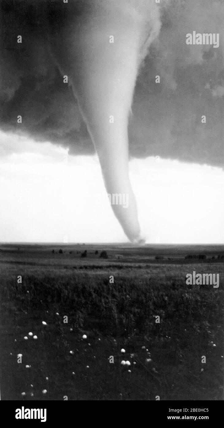 Color enhanced image of a tornado funnel over Hardtner, Kansas on June 2, 1929. The images was taken from Mamie and Fay Rathgeber's farm. A barn and a house were damaged but nobody was hurt. Stock Photo