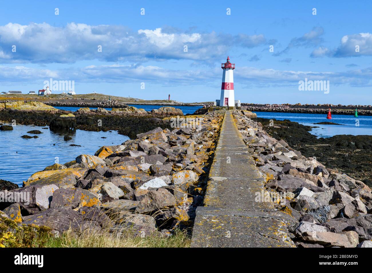 New France, St-PIerre et Miquelon, Canadian Maritimes. Lighthouse in the harbor Stock Photo