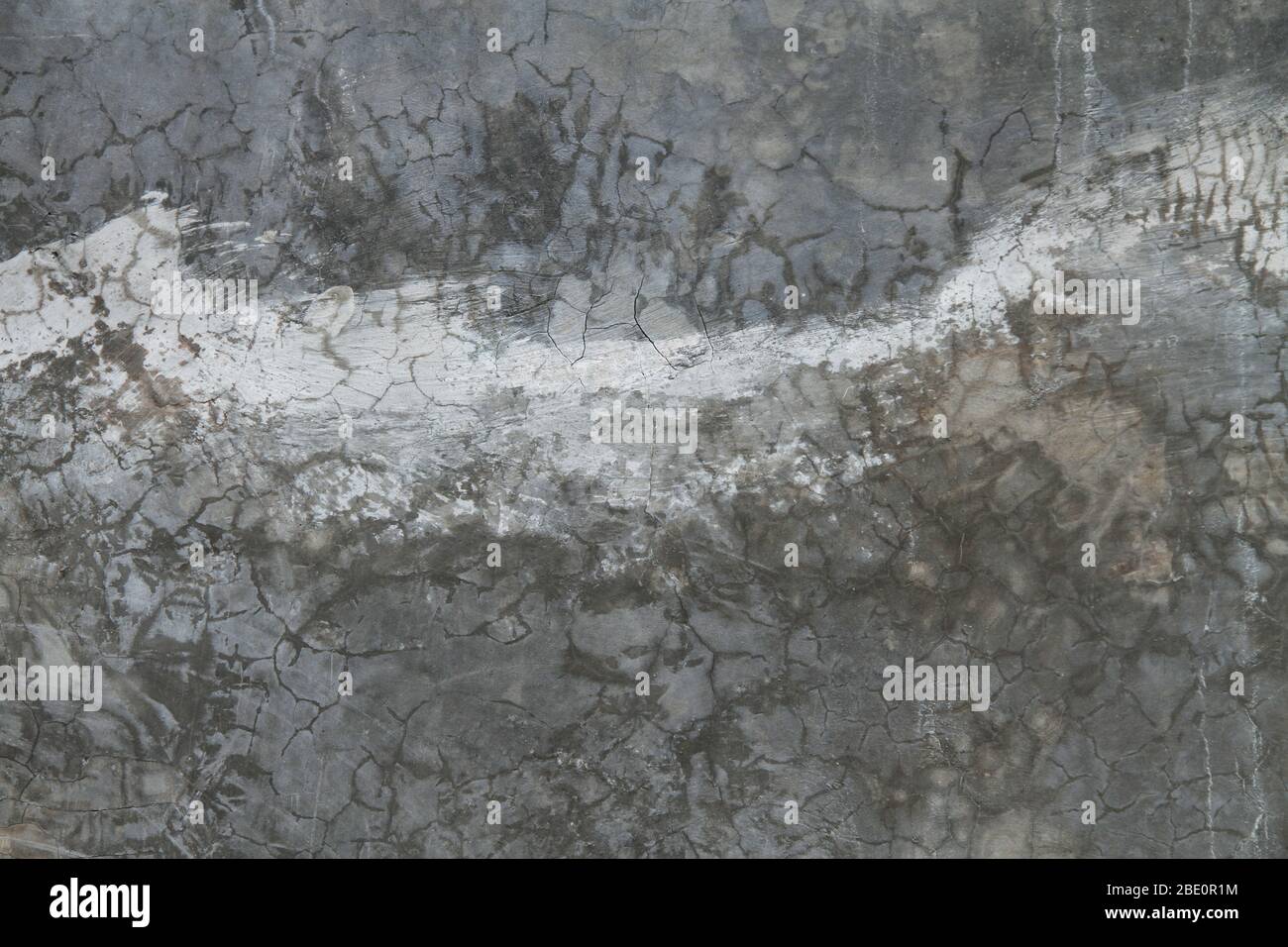 grey color cracked mortar wall texture seamless pattern, background and wallpaper Stock Photo