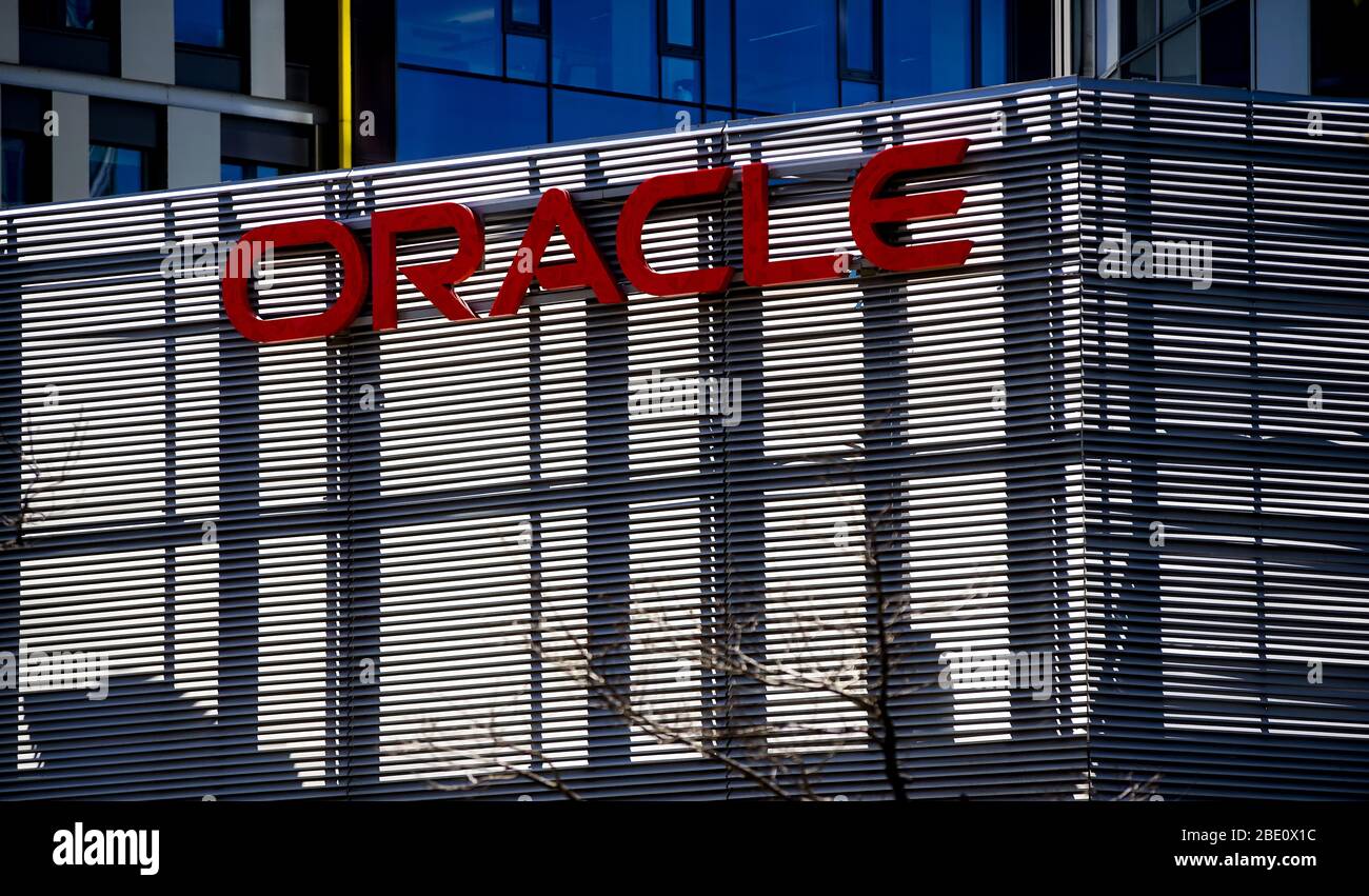Bucharest, Romania - April 08, 2020: Oracle logo is seen on top of an architectural metal fence at ground floor of SkyTower office building in Buchare Stock Photo