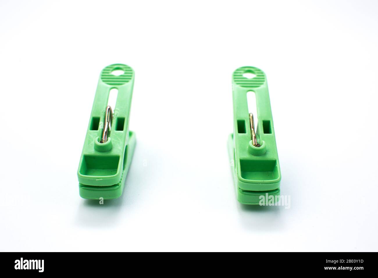 Green clothespins set. Isolated on white Stock Photo Alamy