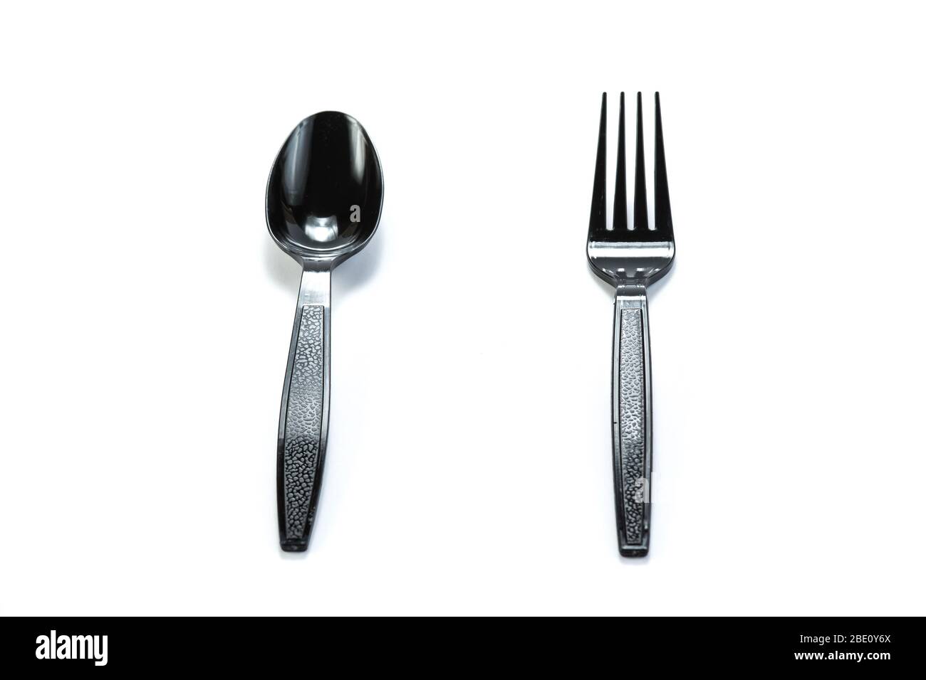black plastic spoon and fork isolated on white background Stock Photo