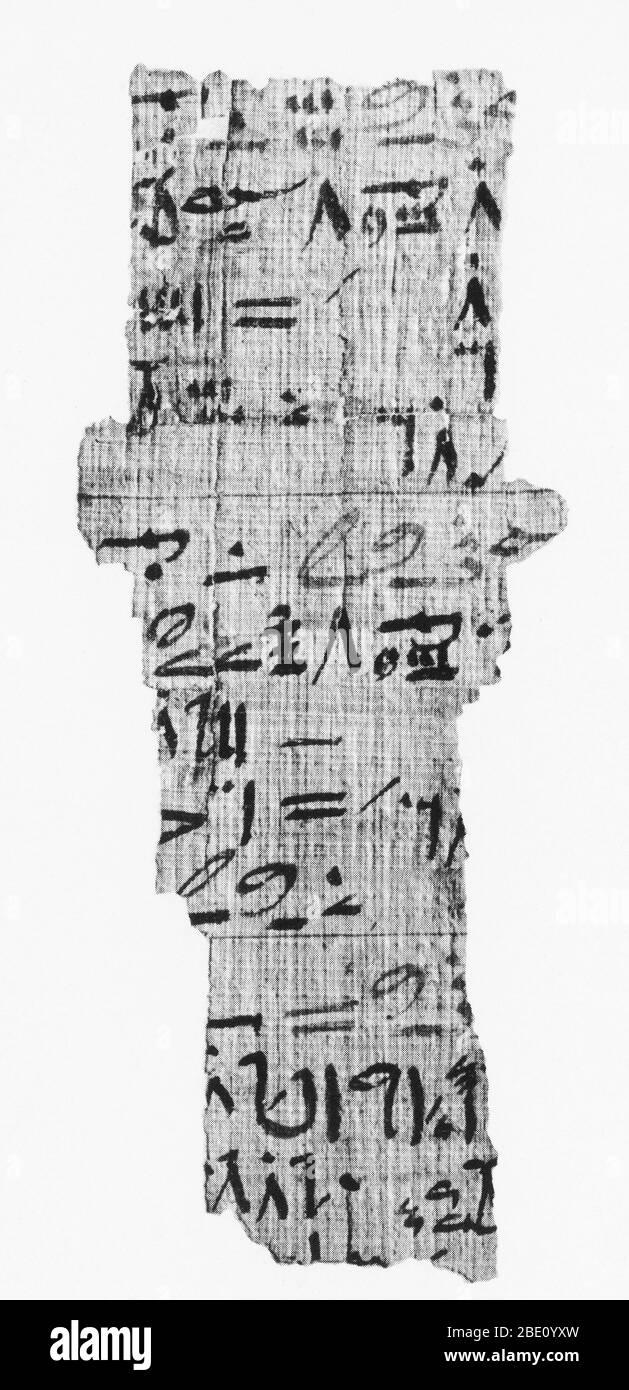 The Rhind papyrus, also known as the Ahmes papyrus, dating to around 1650 BC in Egypt, is one of the earliest mathematical records to be found on a paper-like substance. It is a fragment from a reference book of everyday mathematics used by ancient Egyptians. Stock Photo