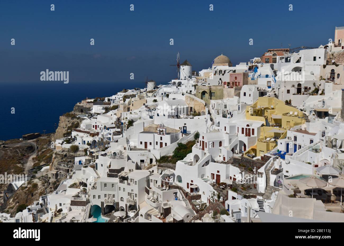 Oia, Santorini: iconic windmill in the caldera area. Greece Stock Photo