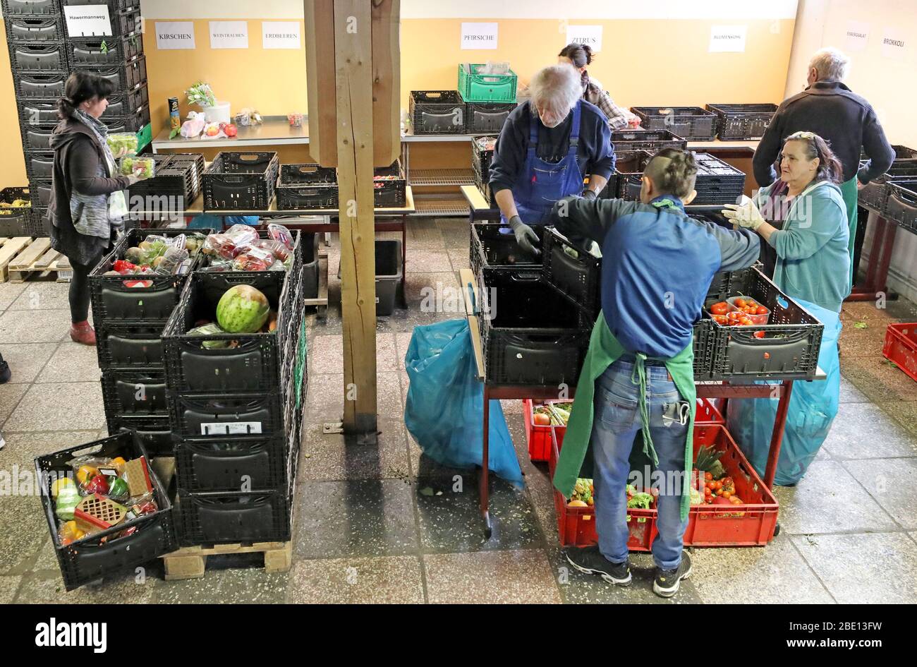 Rostock, Germany. 08th Apr, 2020. At the Tafel, delivered food is inspected  and sorted. At present there are about 15 to 20 helpers less in action than  before the Corona crisis. Most