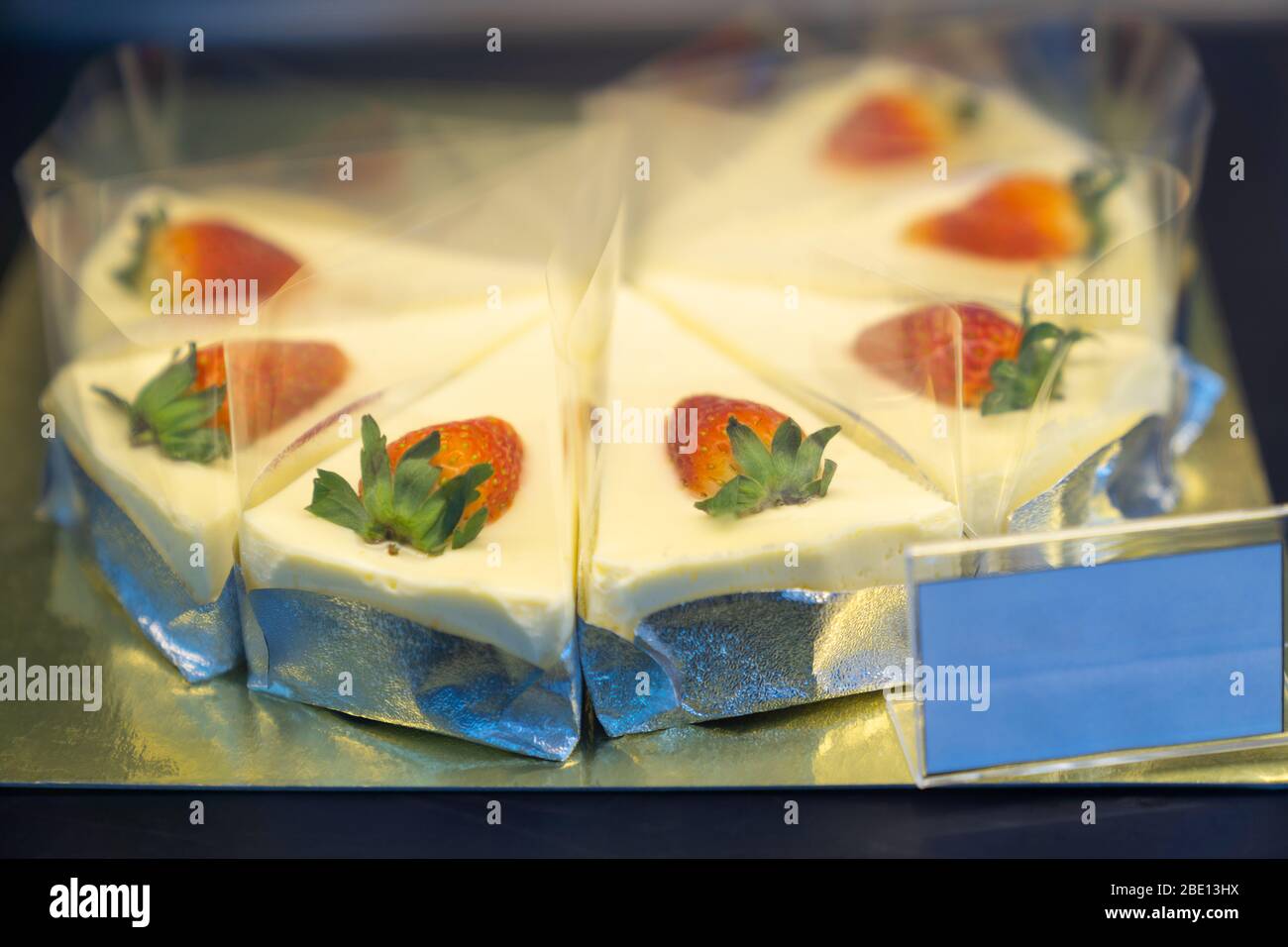 Close up. White chocolate cake with strawberry, home made style, dessert cake in bakery. Stock Photo
