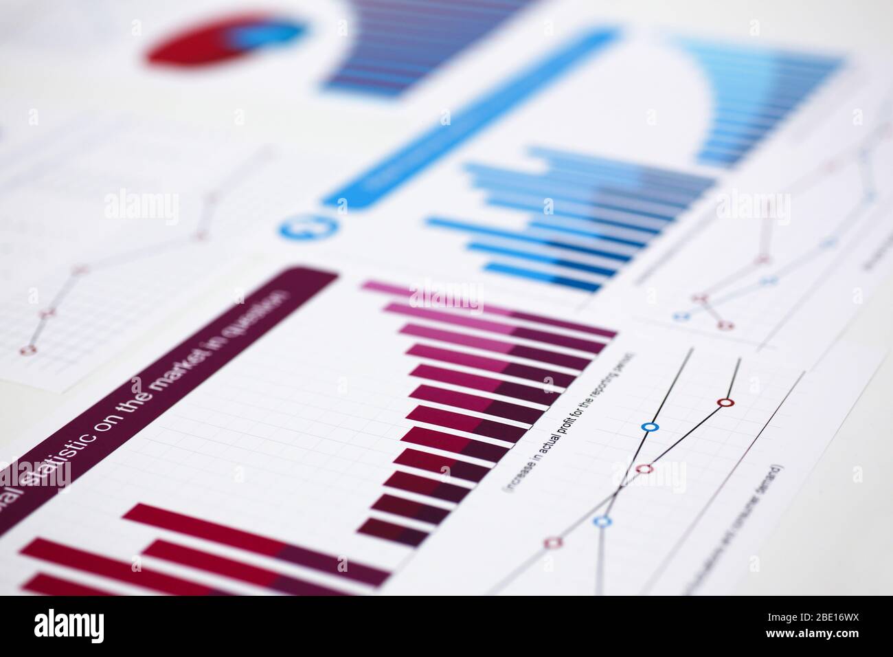 Financial statistics documents on clipboard pad at office table Stock ...