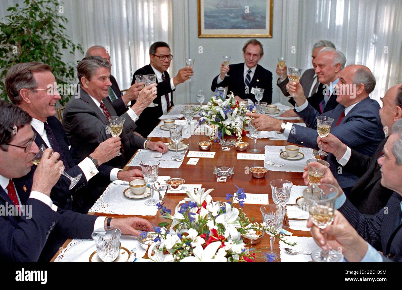 12/7/1988 President Reagan during a trip to New York and a luncheon meeting with General Secretary Gorbachev of the USSR with ken Duberstein George Bush Colin Powell at Governor's Island in New York Stock Photo