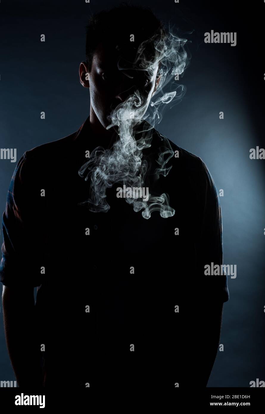 Skinny smoking cigarette hi-res stock photography and images - Alamy
