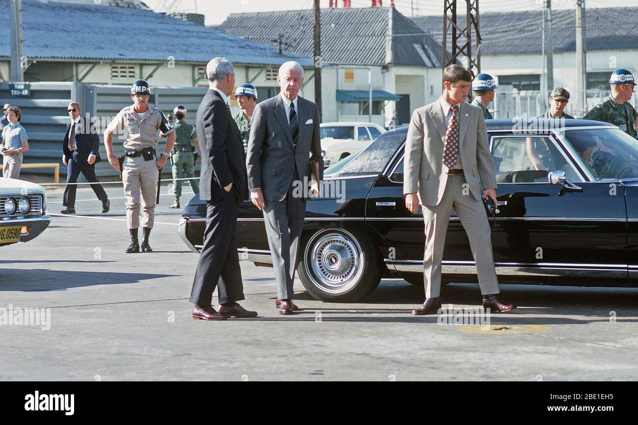 U.S. Ambassador Ellsworth Bunker arrives at Tan Son Nhut Air Base in his automobile to observe the departure of Viet Cong POWs for Loc Ninh prisoner exchange between the United States/South Vietnam and North Vietnam/Viet Cong militaries. Stock Photo