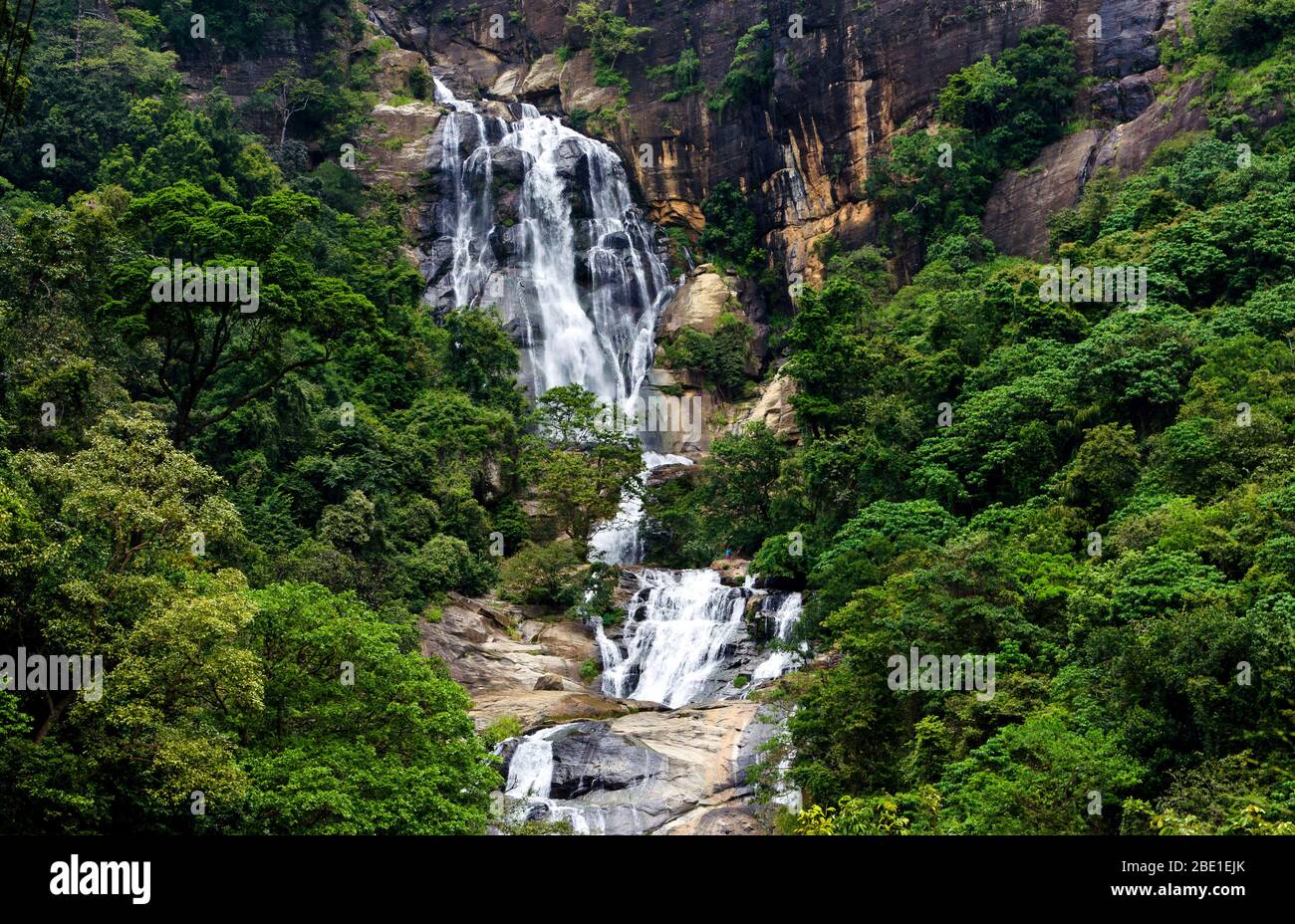 Ravana Falls is a popular sightseeing attraction in Ella, Sri Lanka. It currently ranks as one of the widest falls in the country. Stock Photo