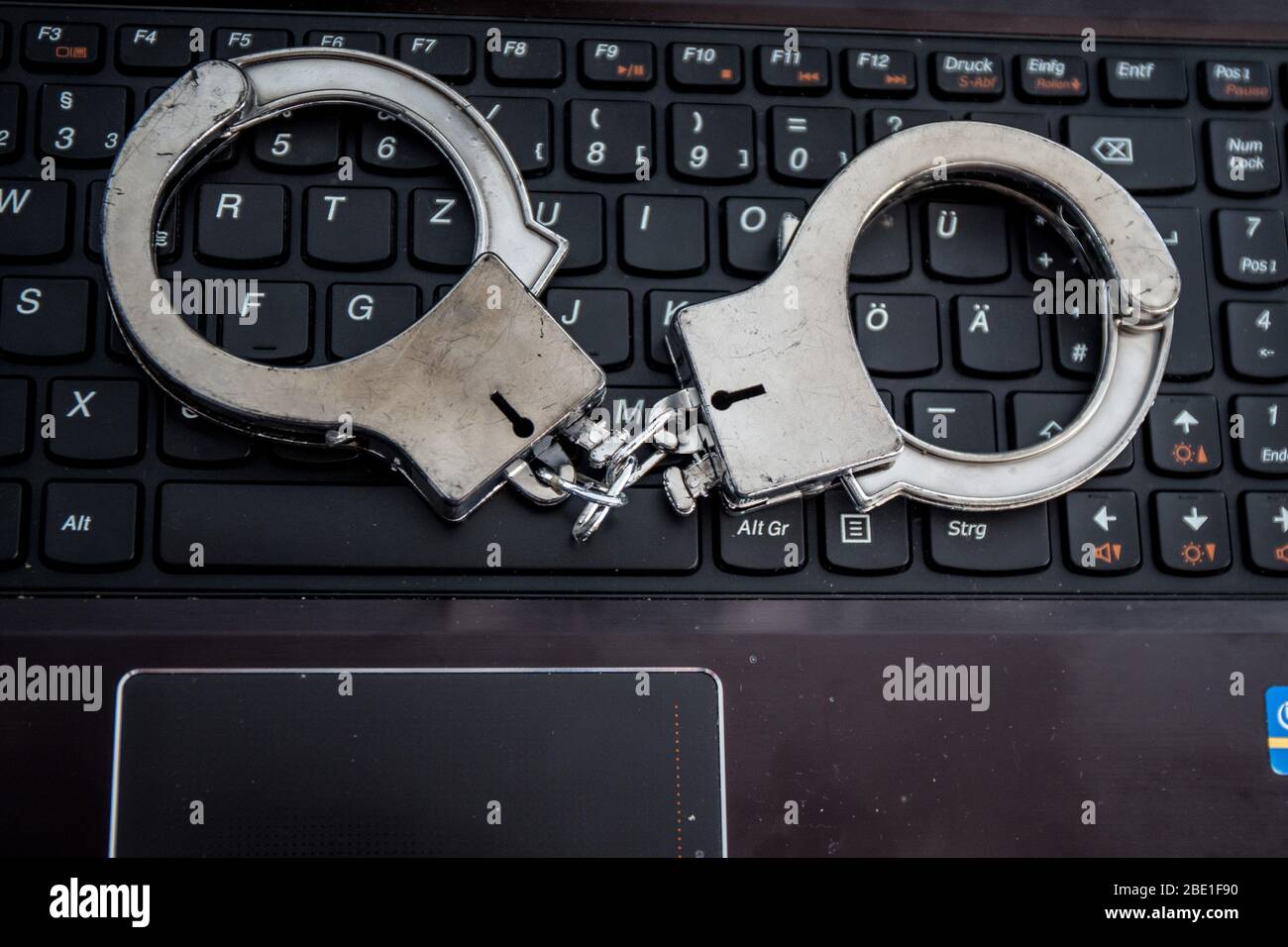 Punishment hacking cybercrime handcuffs hi-res stock photography and ...