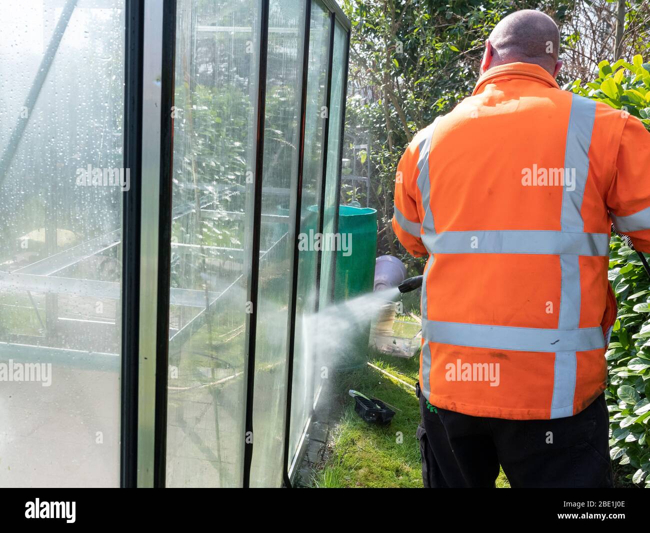Cleaning greenhouse glass hires stock photography and images Alamy