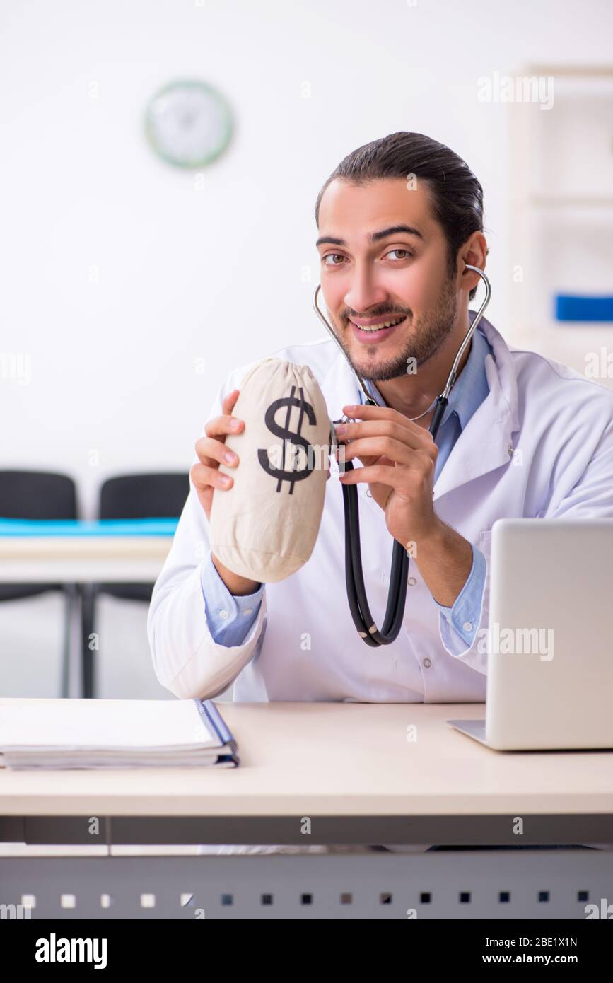 Funny young handsome doctor in hi-res stock photography and images - Alamy