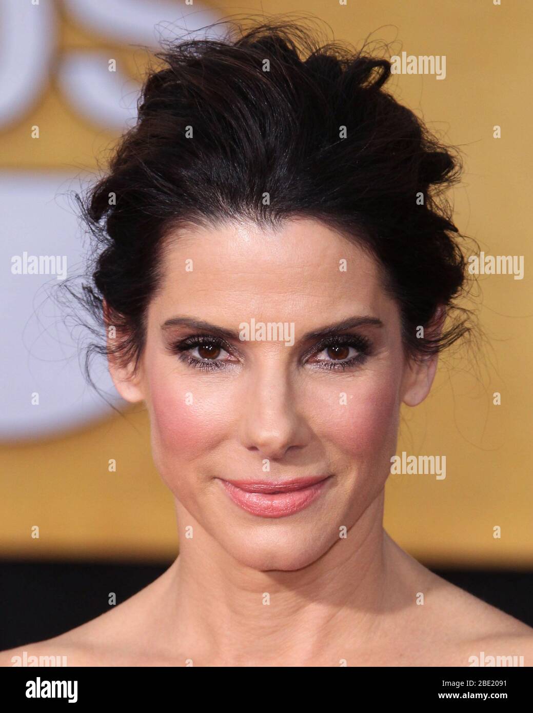 Los Angeles, United States. 11th Apr, 2020. (FILE) Sandra Bullock Donates 6,000 N95 Masks To Los Angeles Hospitals Amid Coronavirus COVID-19 Pandemic. LOS ANGELES, CALIFORNIA, USA - JANUARY 18: Actress Sandra Bullock wearing a Lanvin dress, Jimmy Choo shoes, Roger Vivier clutch, and Fred Leighton jewelry arrives at the 20th Annual Screen Actors Guild Awards held at The Shrine Auditorium on January 18, 2014 in Los Angeles, California, United States. (Photo by Xavier Collin/Image Press Agency) Credit: Image Press Agency/Alamy Live News Stock Photo