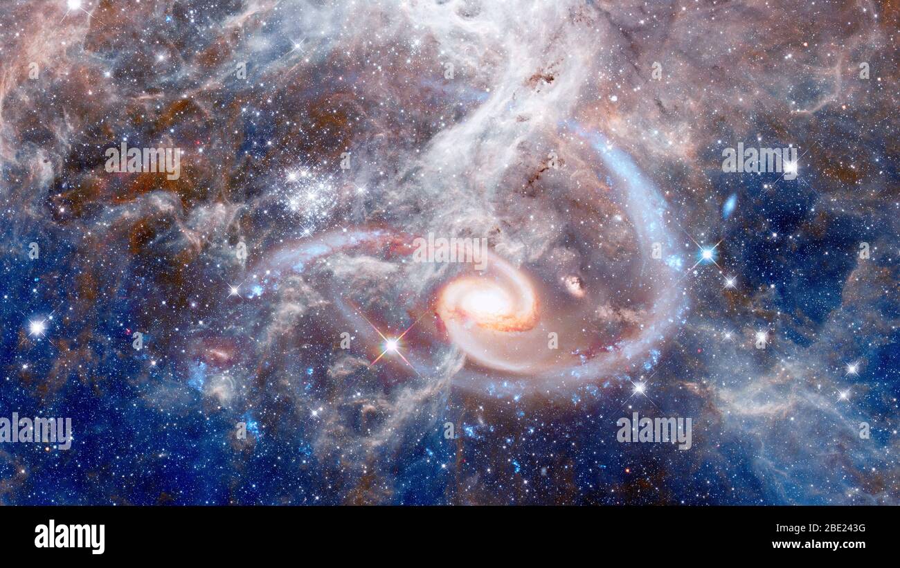 Spiral galaxies and nebula in deep space. Elements of this image furnished by NASA. Stock Photo