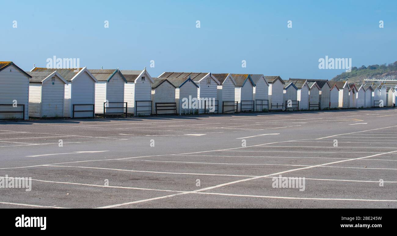 Lyme Regis, Dorset, UK. 11th April 2020. UK Weather: Lyme Regis, Dorset, UK. The carparks are closed and remain empty over the Easter bank holiday weekend making it clear that Lyme Regis is closed for business despite the beautiful warm and sunny weather. The COVID-19 pandemic restrictions are hitting the tourist industry hard in the town and across the South West as visitors and tourists follow Government insturctions to 'stay at home, protect the NHS, and save lives' during coronavirus outbreak. Credit: Celia McMahon/Alamy Live News. Credit: Celia McMahon/Alamy Live News. Stock Photo