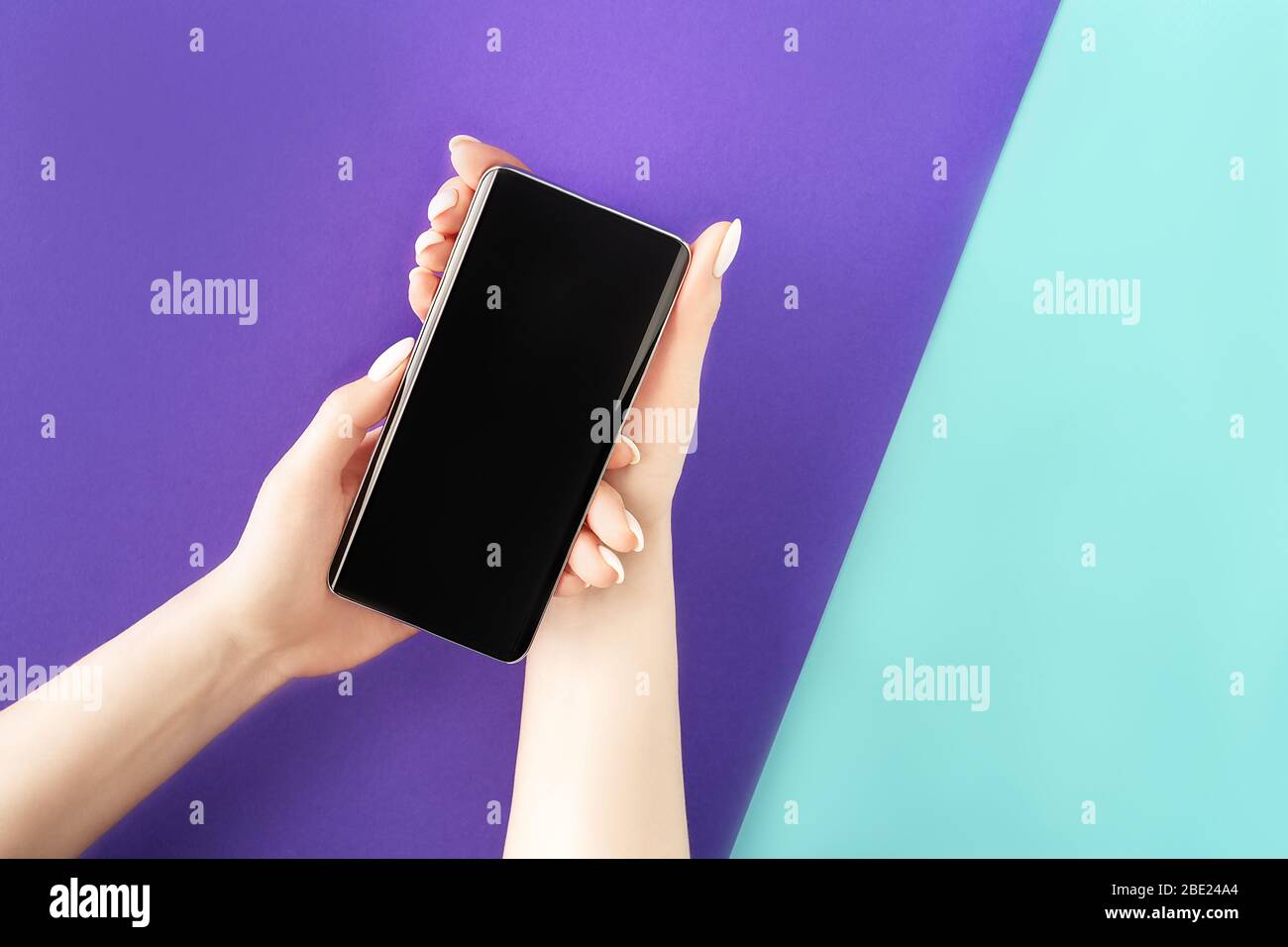 Pretty Android Hand Beautiful female hands with white manicure holding contemporary ...