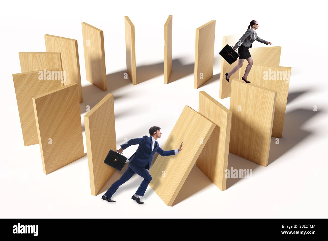 Domino effect and the competition concept Stock Photo - Alamy